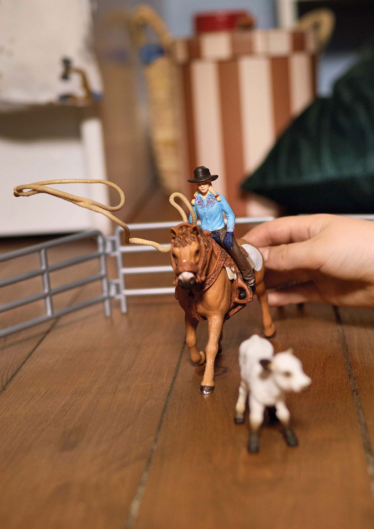 Schleich cowboy with store lasso on horse